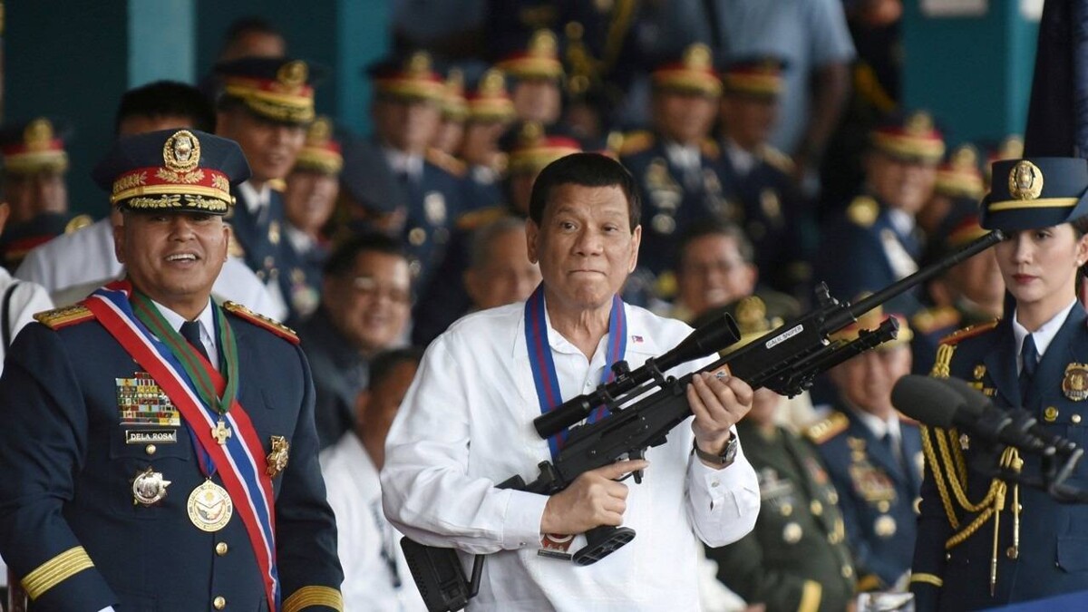 Former Philippine President Accused of Crimes Against Humanity